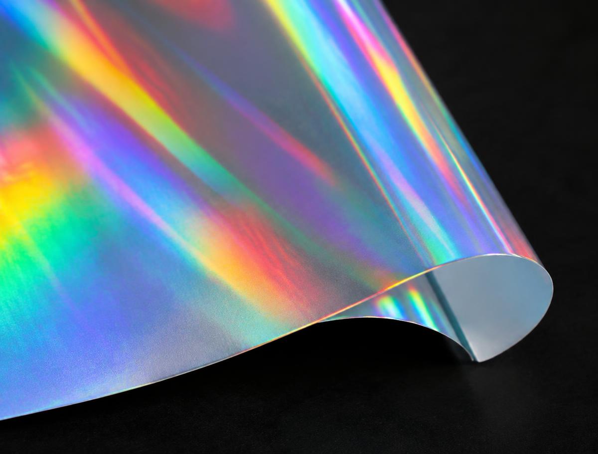 Holographic vinyl sticker material showing its rainbow sheen